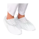 sur-chaussure renforcé blanc en polyéthylène jetable conditionné en 100 unités